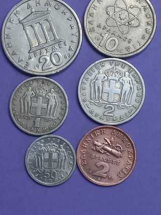 Monedas antiguas griegas Pericles y Demócrito