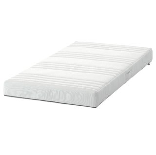 Cuna blanca con cajón y barrotes de madera