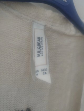Chaqueta punto con pavo real