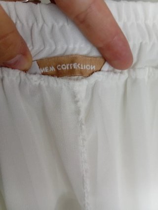 Pantalón blanco plisado talla única con forro