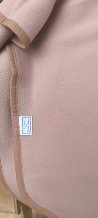 Manta beige de tela