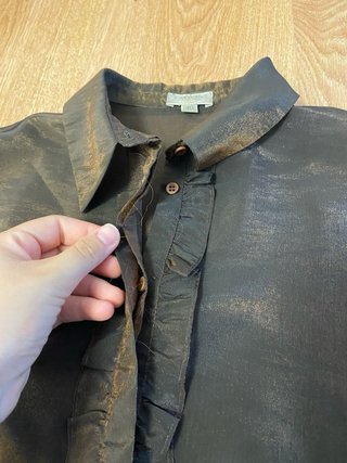 Blusa marrón sin mangas con volantes