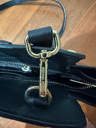 Borsa Michael Kors nera con borchie dorate