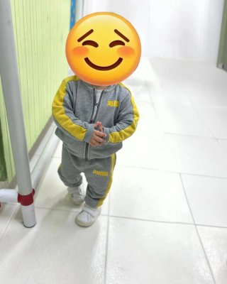 Tuta Puma 9-12 mesi grigio/giallo