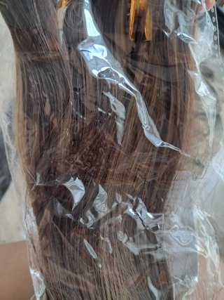 Extensiones de pelo rubio trenzado