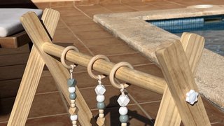 Gimnasio de madera para bebé