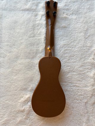 Ukelele de juguete madera decorado
