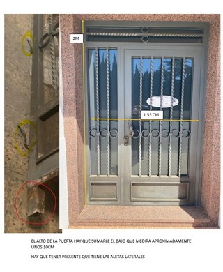 Puerta de forja con cristales