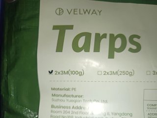 Toldo verde con ojales