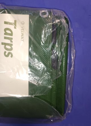 Toldo verde con ojales