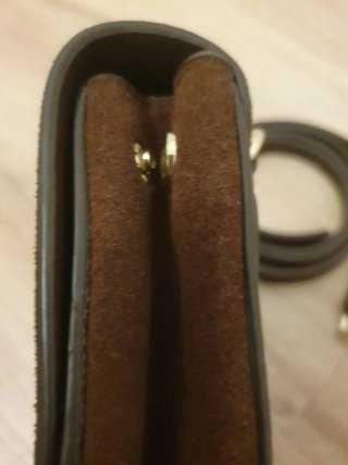 Riñonera de piel sintético marrón. Nuevo, sin uso.