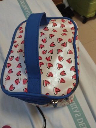 Neceser de viaje con corazones