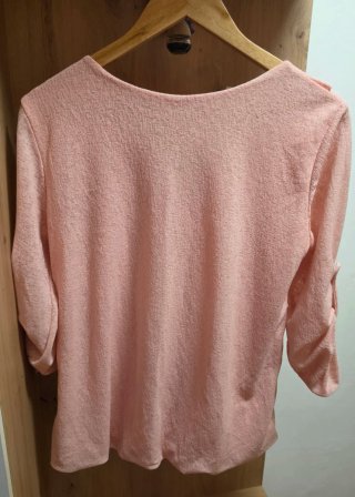 Blusa rosa con volantes