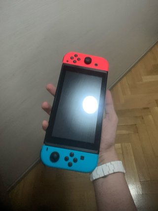 Nintendo Switch Azul y Rojo + Dos Mandos Pro