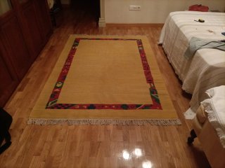 Alfombra de rafia con borde decorativo 195x145