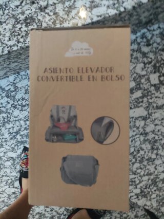 Asiento elevador convertible en bolso