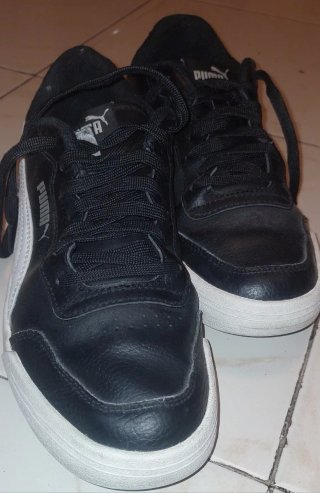 Zapatillas deportivas Puma negras y blancas
