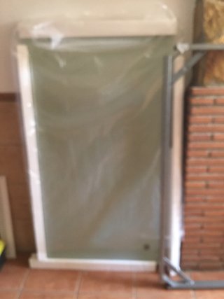 Mesa de exterior cristal y metal gris