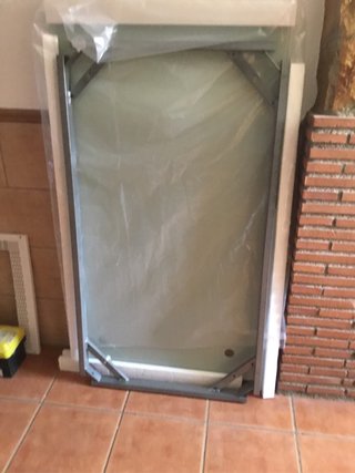 Mesa de exterior cristal y metal gris