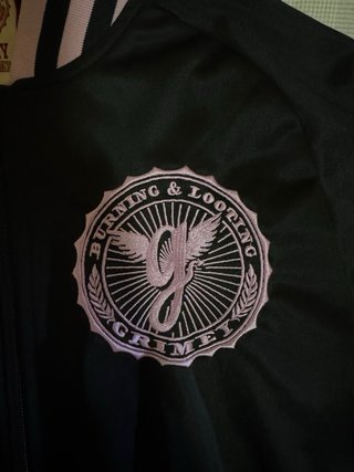 Chaqueta Grimey Track Jacket Negra y Rosa
