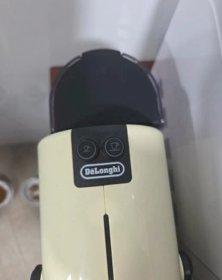 Cafetera Nespresso Inissia + cápsulas