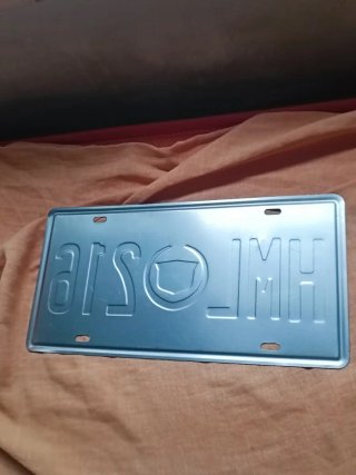 Placa decorativa cadillac