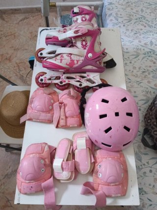Patines en línea rosas + protecciones