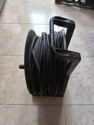 Alargador 50m enrollable.