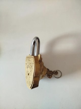 Candado antiguo cabeza de león metal