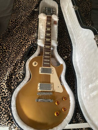 Guitarra Gibson Dorada + Amplificador Fender