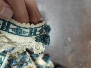 Pasamanería antigua con pompones