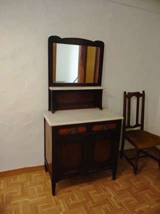 Cama antigua de latón y hierro forjado