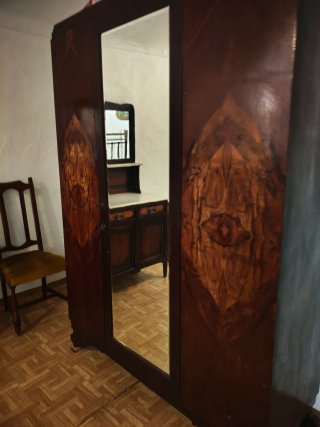 Cama antigua de latón y hierro forjado