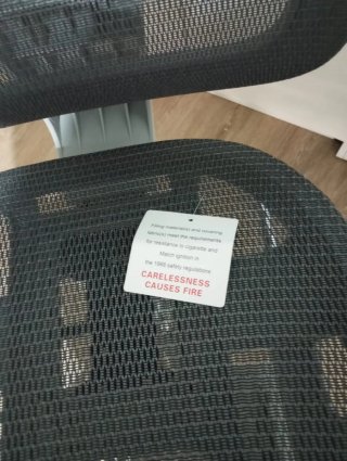 Silla de oficina ergonómica gris