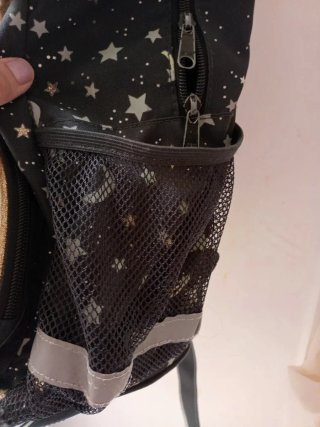 Mochila escolar espacial con estrellas