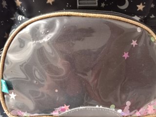 Mochila escolar espacial con estrellas