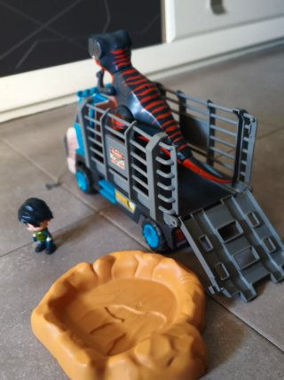 Camión Pinypon con Dinosaurio y Figura