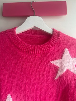 Jersey rosa estrellas blancas