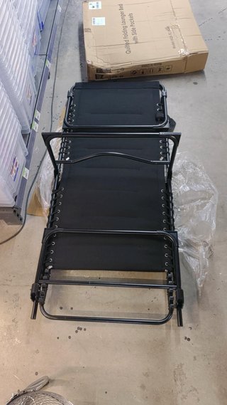 Tumbona plegable acolchada reclinable