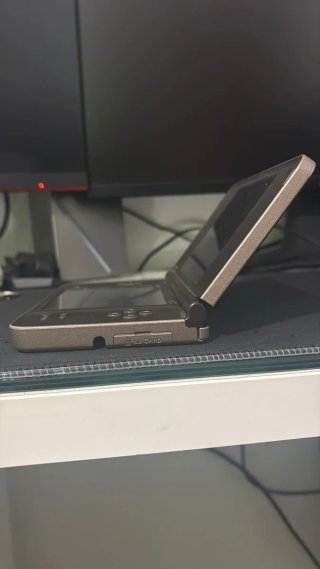 Nintendo DSi XL Negra + 4 Juegos