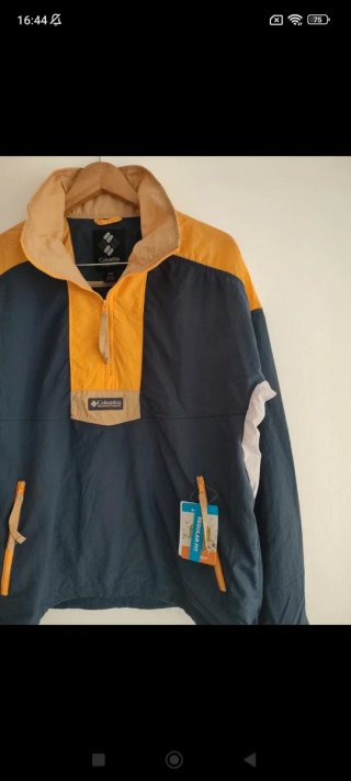 Cortavientos Columbia azul y amarillo