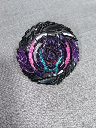 Peonza de batalla morada y negra