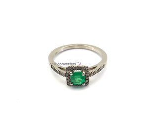sortija oro 18k con piedra con diamante,esmeralda