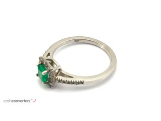 sortija oro 18k con piedra con diamante,esmeralda