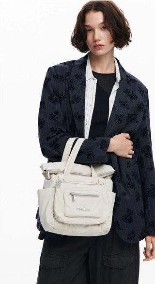Mochila Desigual multiposición beige y negra