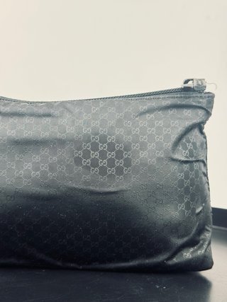 Pochette Gucci nera monogram