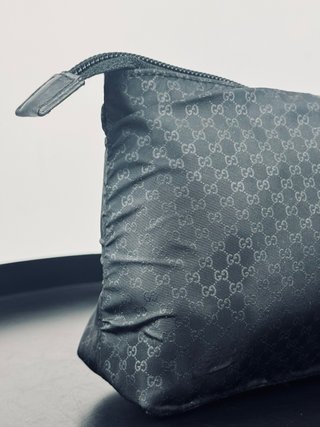 Pochette Gucci nera monogram
