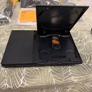 PlayStation 2 Slim 100% Completa.