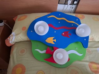 Lámpara infantil de peces y olas