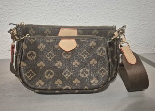 Bolso bandolera multi-compartimentos